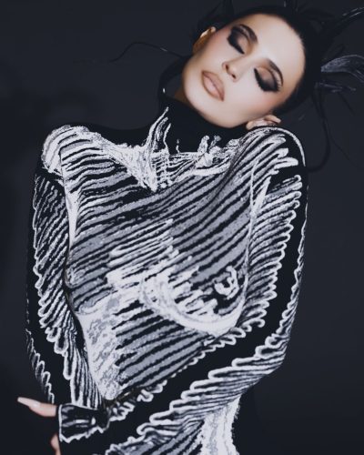 Kylie Jenner yellow jacket paired with trendy sandals