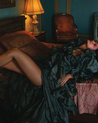 Kylie Jenner striking black bra and tailored high-waisted pants