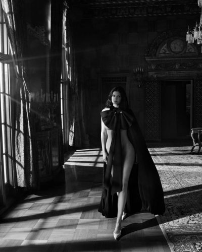 Kylie Jenner fitted black bra with beige high-waisted pants