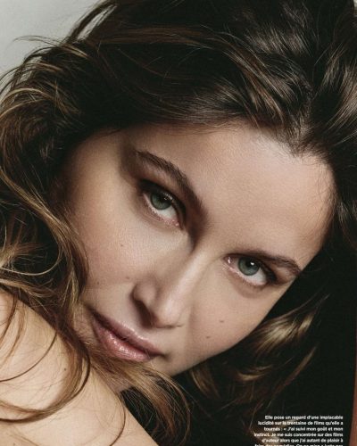 Laetitia Casta in black dress at appearance