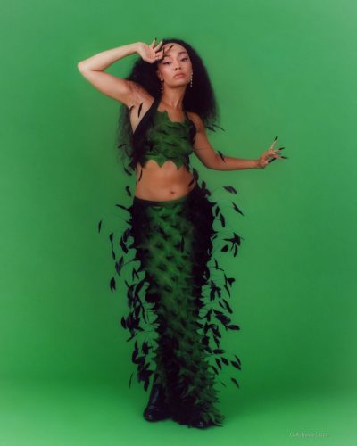 Leigh-Anne Pinnock in vibrant yellow dress artistic design