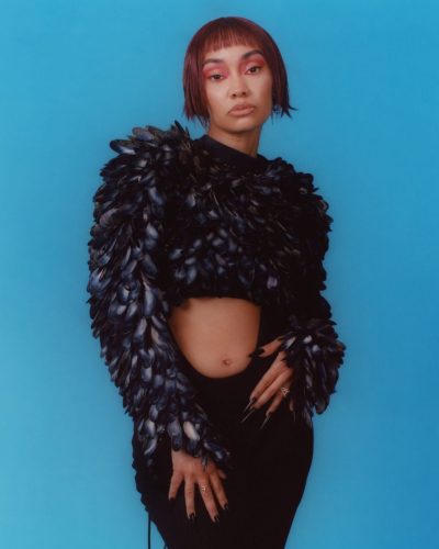 Leigh-Anne Pinnock in vibrant yellow gown with flowing skirt