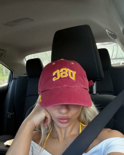 Leila Faler in yellow polka-dotted bikini and sporty cap