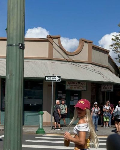 Leila Faler wearing yellow bikini and casual red hat