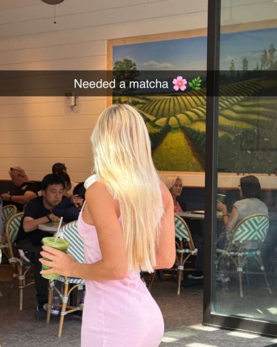 Leila Faler in a white top and matching shorts