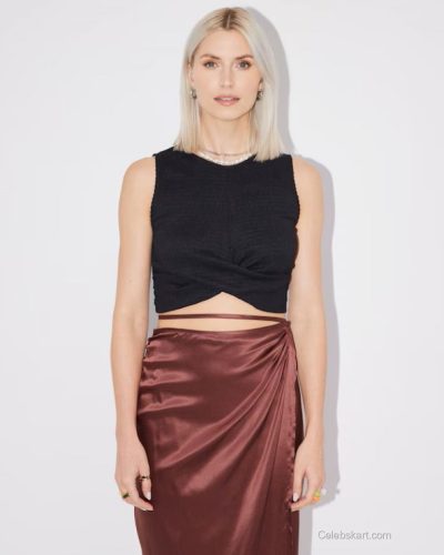 Lena Gercke tailored trousers emphasizing her waistline