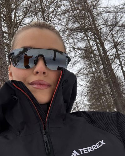 Lena Gercke tailored trousers emphasizing her waistline