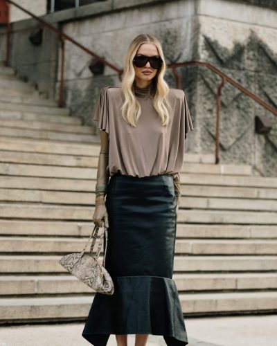 Leonie Hanne brown draped silk top with black skirt