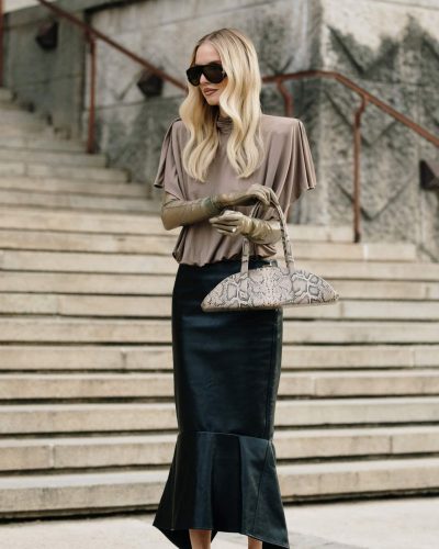 Leonie Hanne black flared skirt and trendy brown top