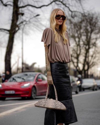 Leonie Hanne brown top paired with black mermaid skirt