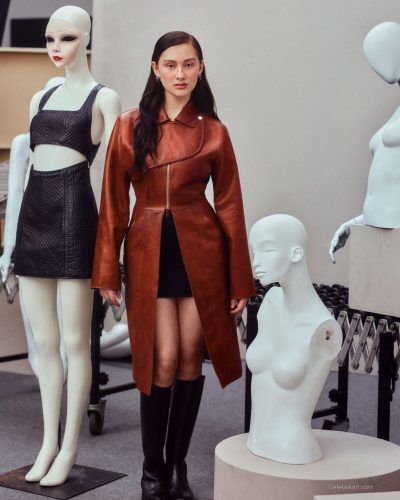 Lili Reinhart in elegant light blue and white tailored attire