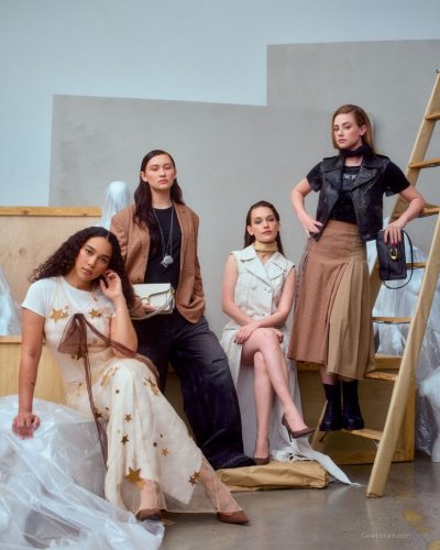 Lili Reinhart dressed in multi-textured light blue and white ensemble