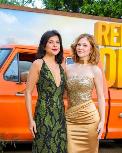 Lily Brooks O'briant eye-catching gold dress with stylish slit