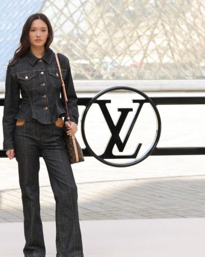 Lily Chee in chic high-heeled shoes complementing denim look