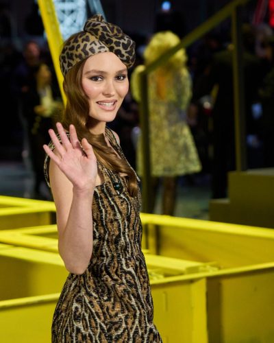 Lily-Rose Depp leopard print dress featuring soft wave hairstyle