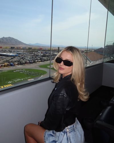 Lindsay Brewer in a beautiful burgundy dress with fresh makeup.