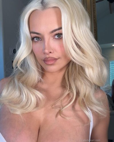 Lindsey Pelas wearing leopard print top and stylish bikini bottoms