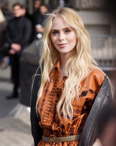 Loreto Peralta in elegant brown gown with stylish belt