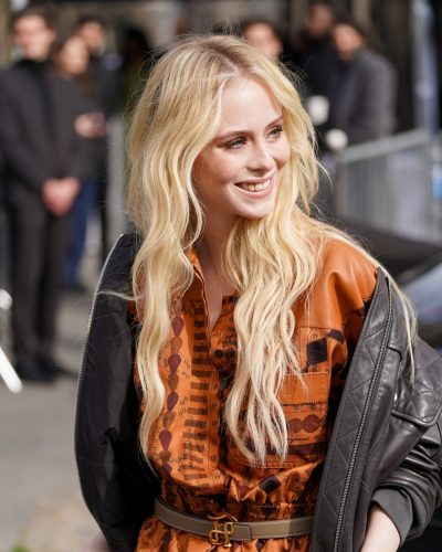 Loreto Peralta in chic brown dress paired with edgy bomber