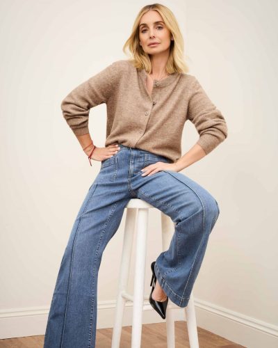 Louise Redknapp with layered necklaces and brown shirt ensemble.