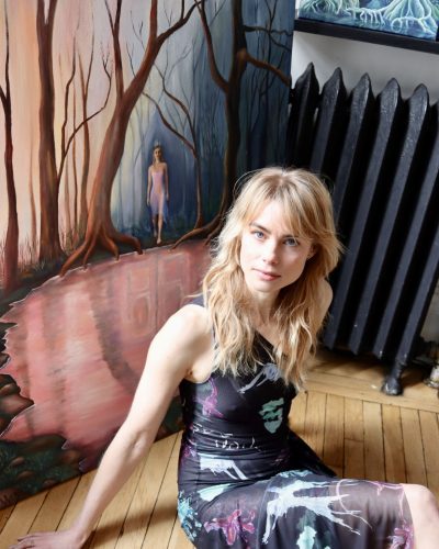 Lucy Fry fashionable dress with a stylish cut