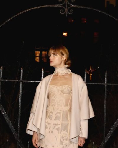 Lucy Fry delicate lace dress in soft pastel colors