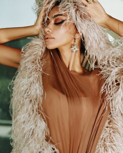 Madalina Ghenea brown flowing gown with soft textures and layers