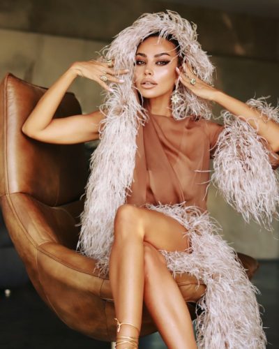 Madalina Ghenea form-fitting bodice and relaxed gown design