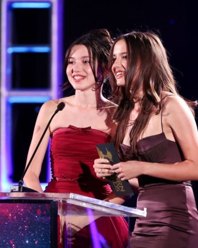 Madeleine McGraw elegant burgundy dress with a modern twist