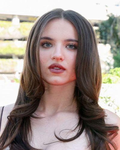 Madeleine McGraw burgundy gown with a playful sweetheart neckline