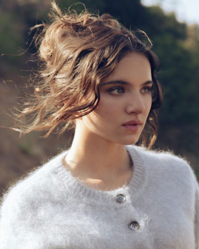 Madeleine McGraw wearing pale pink blouse and fitted skirt