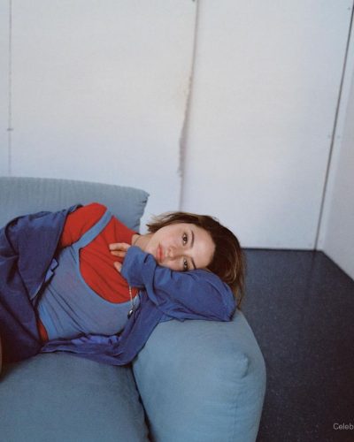 Madelyn Cline featuring a striking red top with white bottoms.