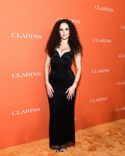 Madison Pettis black gown complemented by curly hair