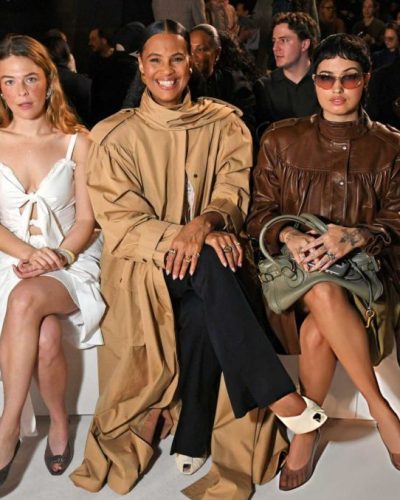 Maggie Rogers flowing white gown with soft ruffles