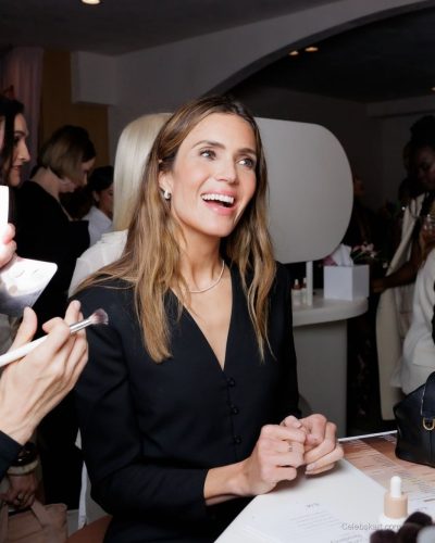 Mandy Moore wearing classic black jacket and tailored trousers