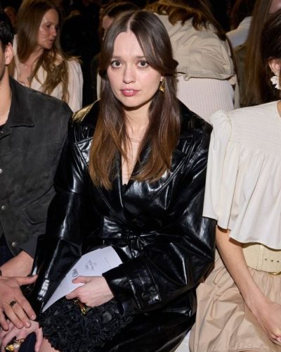 Maude Apatow white top with puffed sleeves and chic belt