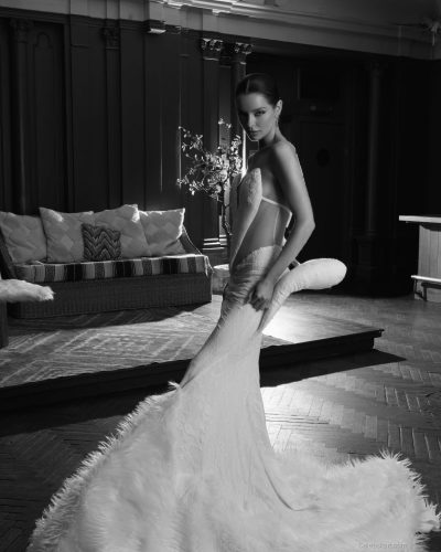 Maura Higgins minimalist gray dress with striking collar