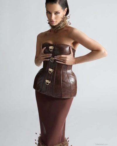 Maura Higgins contemporary gray dress with fashionable accessories