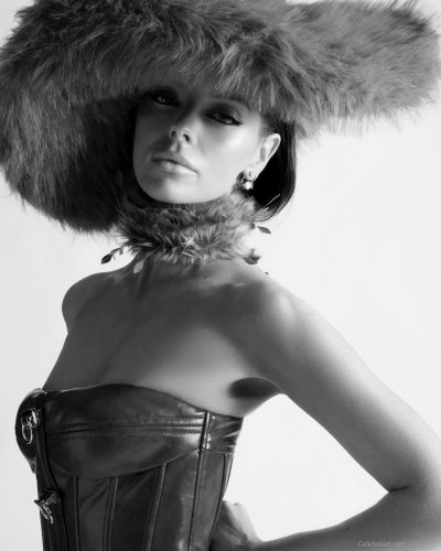 Maura Higgins chic gray dress paired with black heels