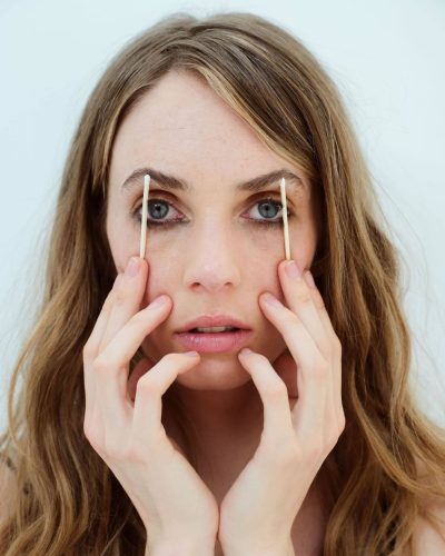 Maya Hawke in chic silk top with natural makeup