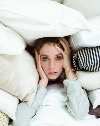 Maya Hawke in flowing silk top with cascading hair