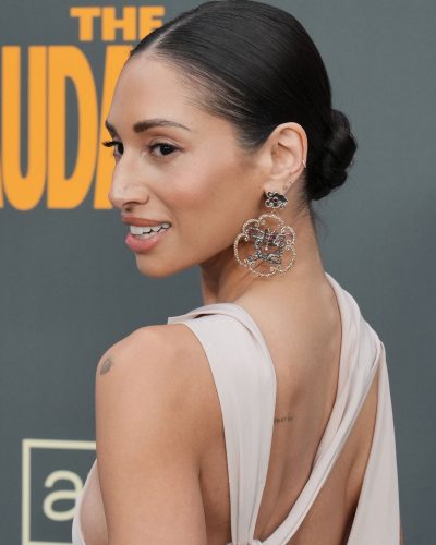 Meaghan Rath light beige gown with draped neckline and sleek silhouette