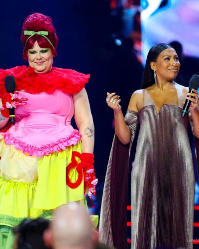 Melanie Fiona a unique silhouette in a bronze gown