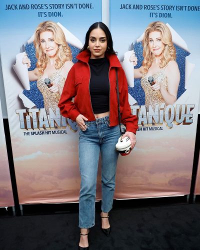 Melissa Barrera wearing a black top with light-wash jeans