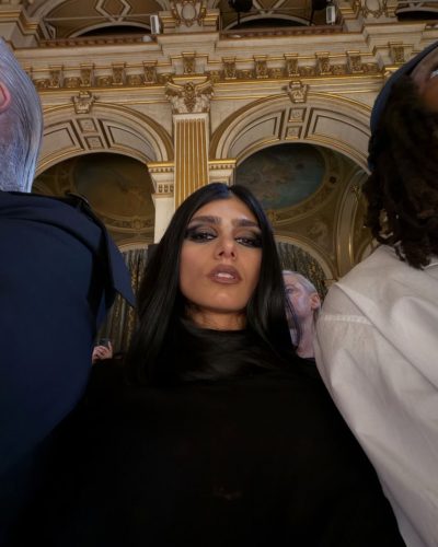 Mia Khalifa black dress with striking makeup