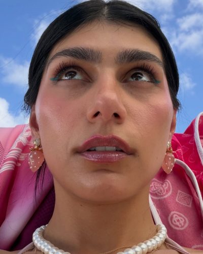 Mia Khalifa in pink bikini and matching accessories