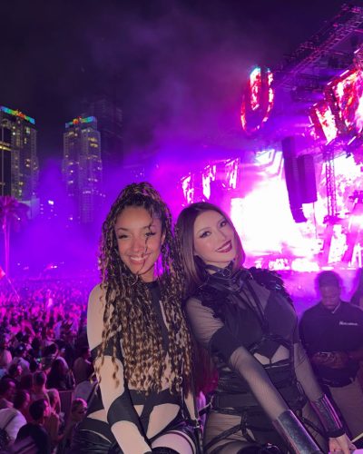 Mika Takeuchi styled in black outfit with bold silver jewelry