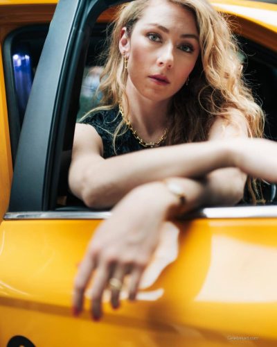 Mikaela Shiffrin in black top under yellow jacket