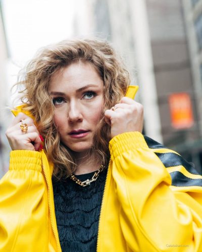 Mikaela Shiffrin in yellow jacket with playful styling