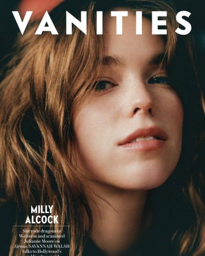 Milly Alcock in a warm-toned casual shirt.